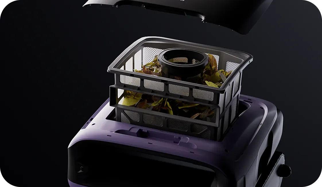 Beatbot Sora 70 with its top cover lifted off and the debris basket raised out of the purple body, full of leaves
