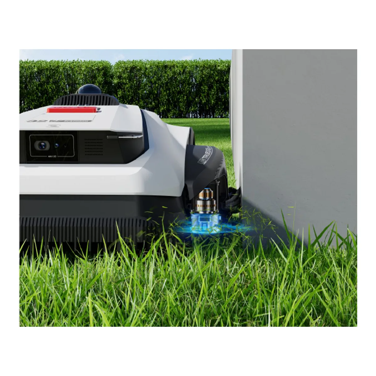 ECOVACS GOAT A2000 LiDAR PRO running its TruEdge string trimmer against a white wall at the edge of a lawn