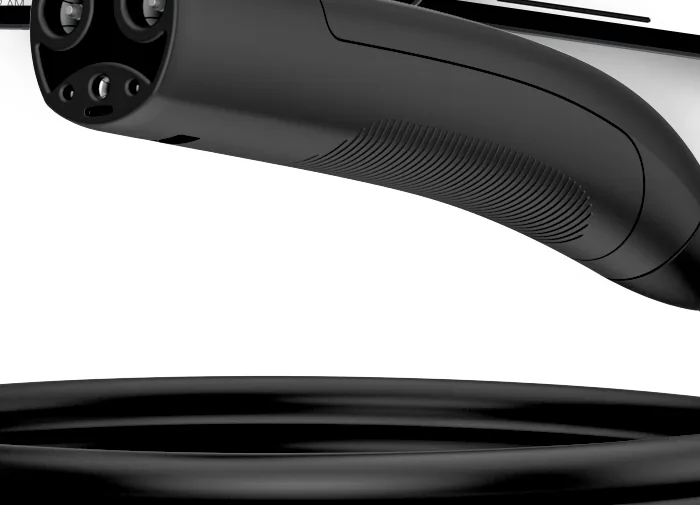 Close-up of the Emporia charger NACS connector head showing its flatter two-pin NACS face