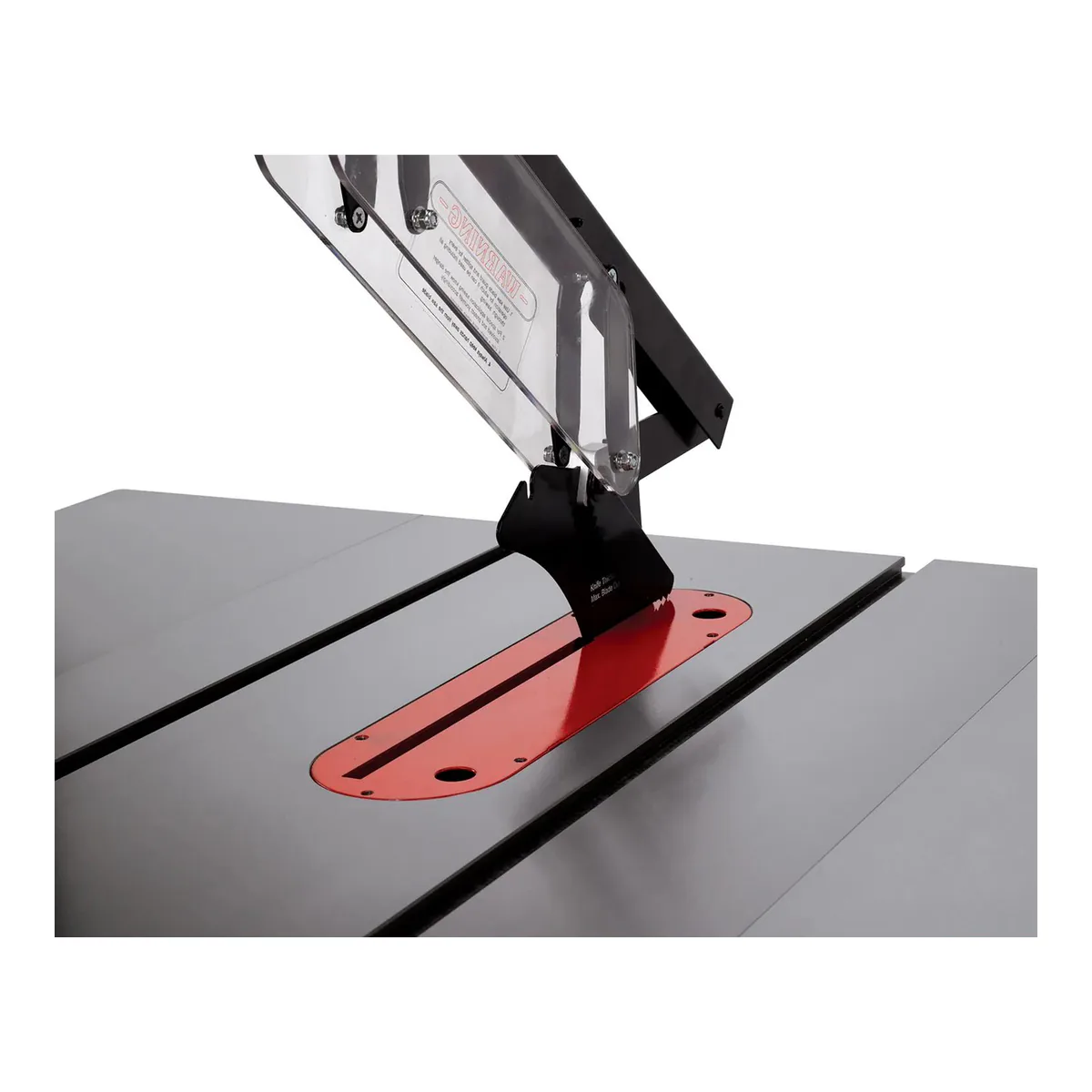 JET Deluxe XACTA cast iron table with the red throat insert, the riving knife standing in it and the clear blade guard raised above