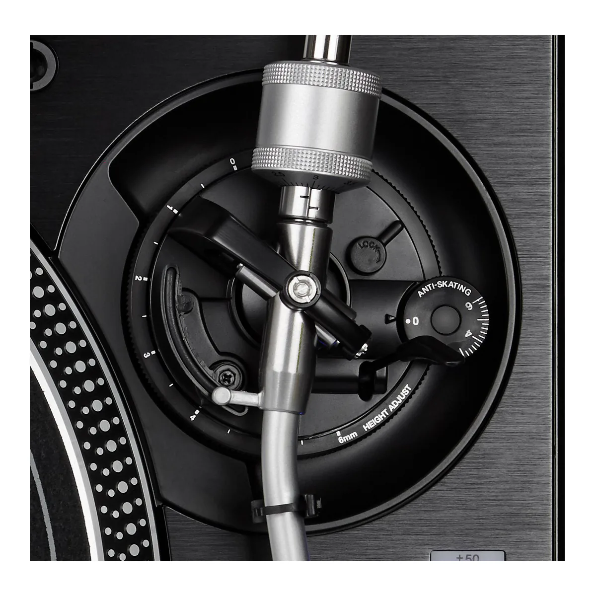 PLX-1000 tonearm base close up with the height adjust ring marked to 6mm, arm lock, lifter and anti-skating dial